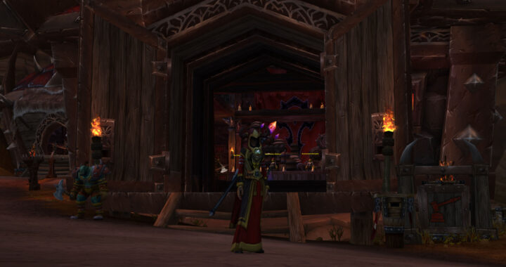 Masterful mage character poised in front of the bustling Orgrimmar Auction House, a key hub for trading and commerce in the World of Warcraft virtual realm