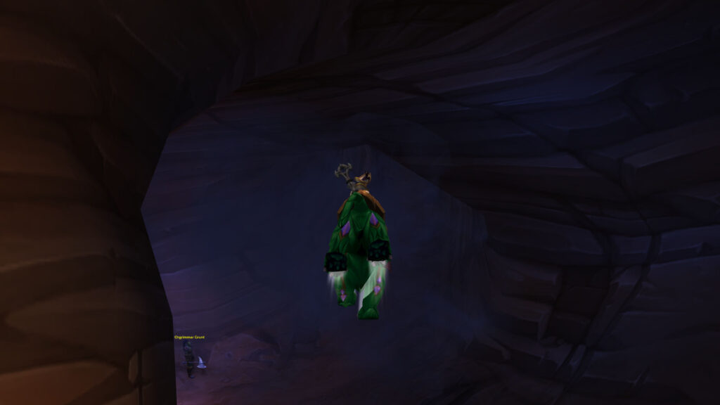 Screenshot of a mage soaring through Orgrimmar on a Jade Panther, en route to a vendor in World of Warcraft.