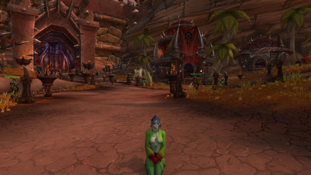 Dracthyr Evoker sitting outside in Orgrimmar